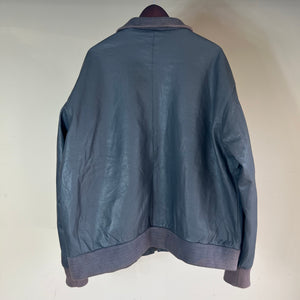 80’s leather jacket fits like an XL